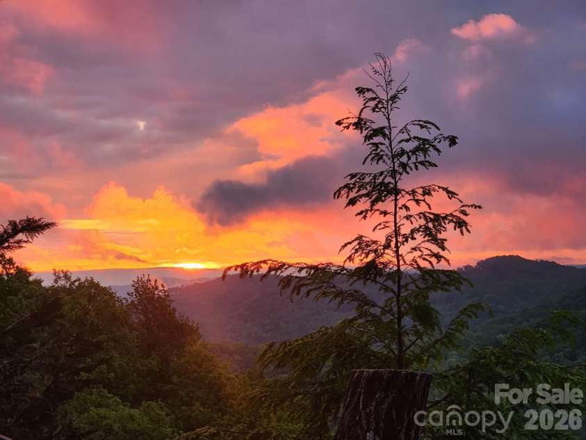 2053 Nancy Mountain Road, Rosman, NC 28772.  MLS# CAR4381811, YatesRealty ID 347. Sunrise driving down Nancy Mountain
