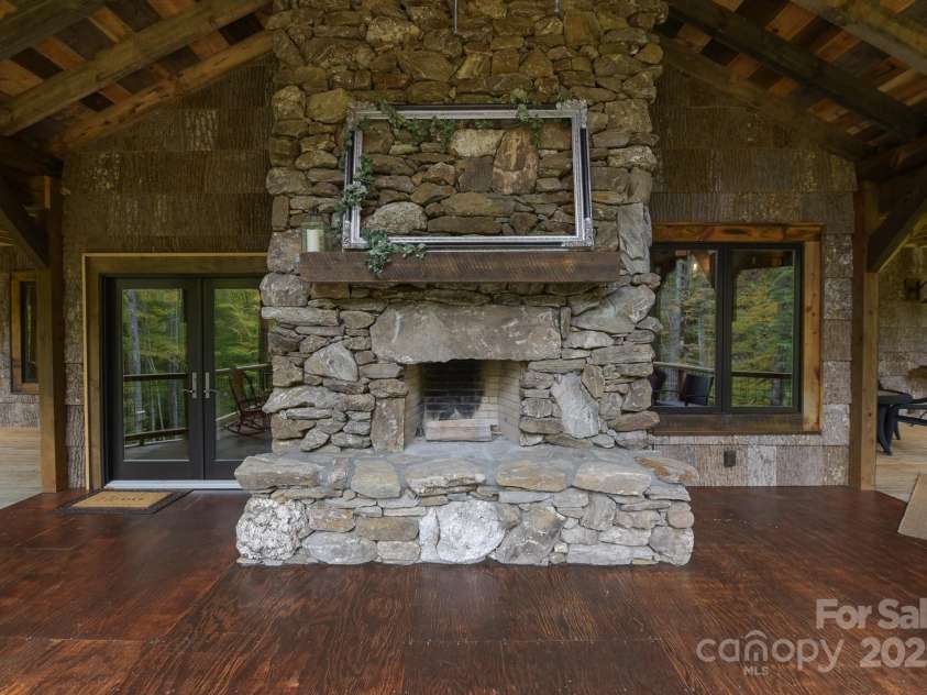 16 Gihon Waters Trail, Canton, NC 28716.  MLS# CAR4291621, YatesRealty ID 34705. BACK PORCH FIREPLACE