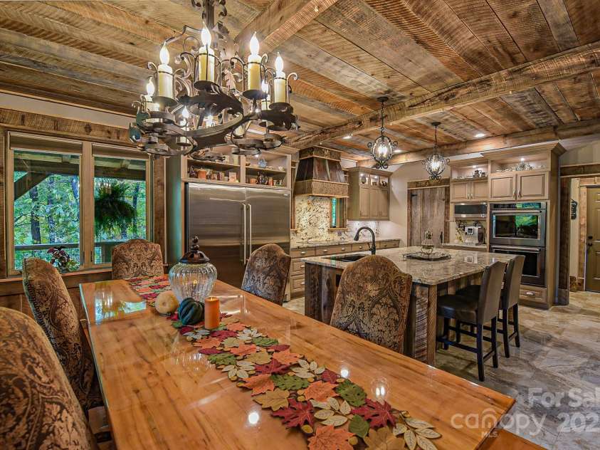 16 Gihon Waters Trail, Canton, NC 28716.  MLS# CAR4291621, YatesRealty ID 34705. DINING KITCHEN OPEN VIEW