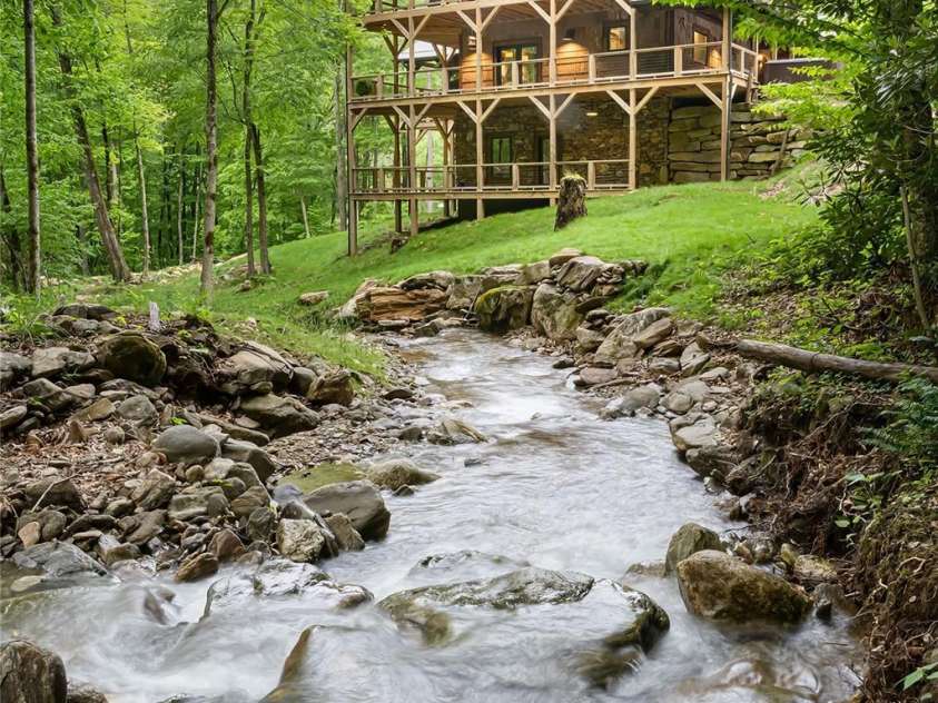 16 Gihon Waters Trail, Canton, NC 28716.  MLS# CAR4291621, YatesRealty ID 34705. Home with Creek view