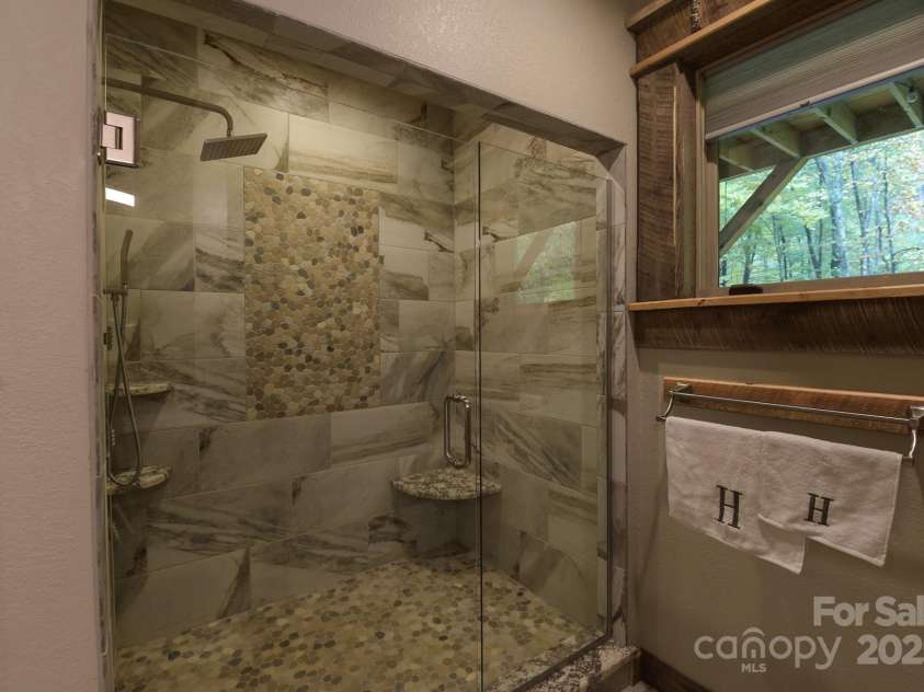 16 Gihon Waters Trail, Canton, NC 28716.  MLS# CAR4291621, YatesRealty ID 34705. MAIN LEVEL SHOWER