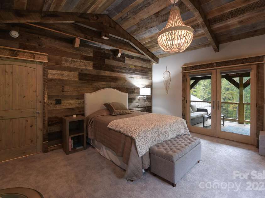 16 Gihon Waters Trail, Canton, NC 28716.  MLS# CAR4291621, YatesRealty ID 34705. UPPER LEVEL GUEST SUITE 2 WITH PRIVATE PORCH