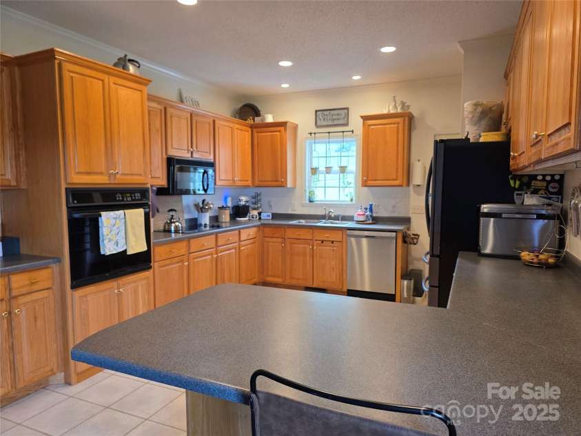 21 Persimmon Drive, Mills River, NC 28759.  MLS# CAR4289280, YatesRealty ID 34706. 