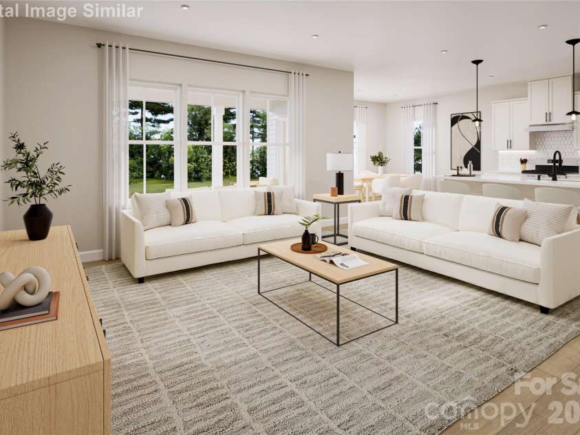 3145 Ravenfield Lane, Charlotte, NC 28213.  MLS# CAR4400180, YatesRealty ID 34708. The great room feels fresh and full of energy — an open floorplan that flows beautifully and brings an exciting, airy vibe to everyday living.