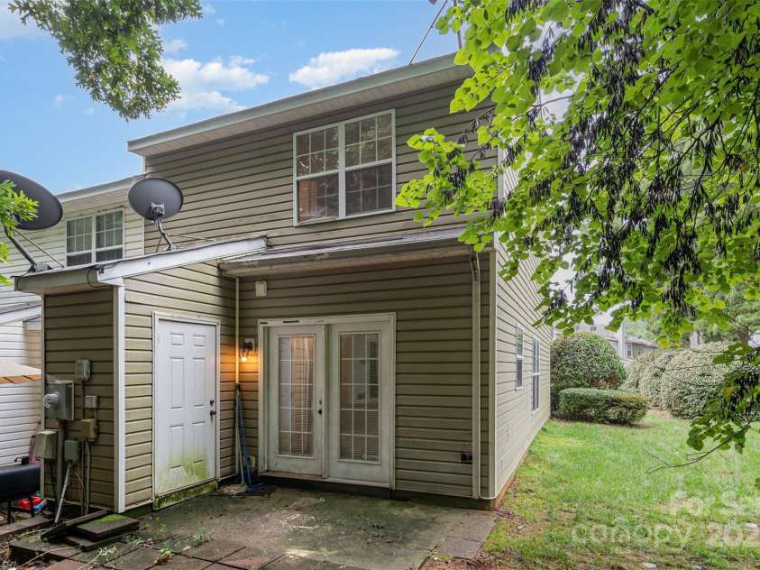 5921 Cougar Lane, Charlotte, NC 28269.  MLS# CAR4291089, YatesRealty ID 34708. Back patio & storage closet