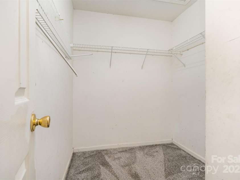5921 Cougar Lane, Charlotte, NC 28269.  MLS# CAR4291089, YatesRealty ID 34708. Bedroom 2 walk-in closet