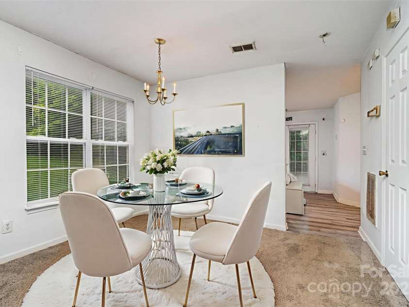 5921 Cougar Lane, Charlotte, NC 28269.  MLS# CAR4291089, YatesRealty ID 34708. Dining area *virtually staged*