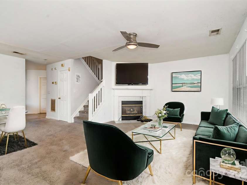 5921 Cougar Lane, Charlotte, NC 28269.  MLS# CAR4291089, YatesRealty ID 34708. Living Room *virtually staged*