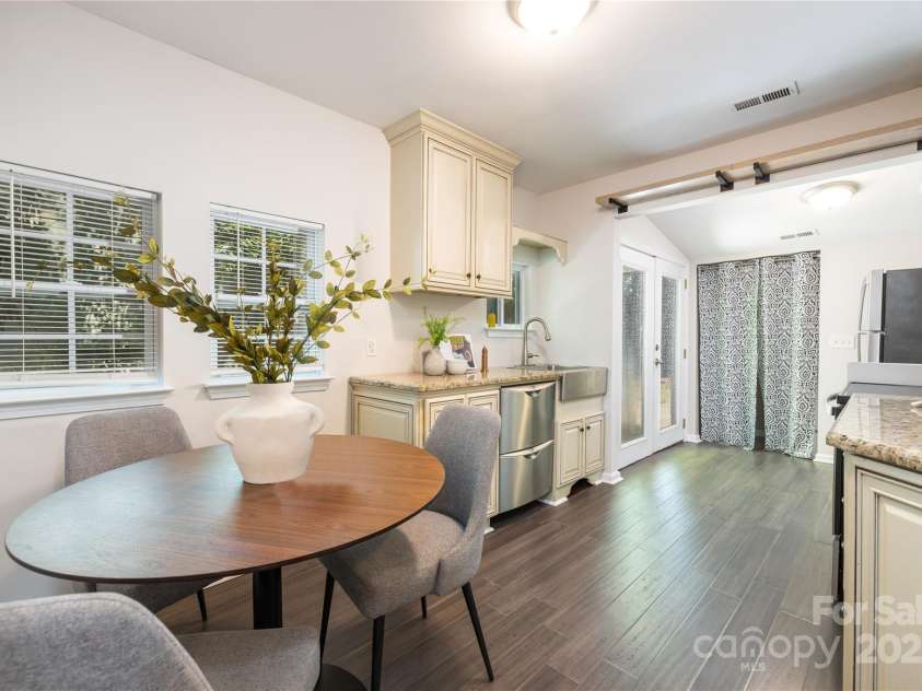 1325 Shamrock Drive, Charlotte, NC 28205.  MLS# CAR4285688, YatesRealty ID 34710. Kitchen prior to staging removal. 