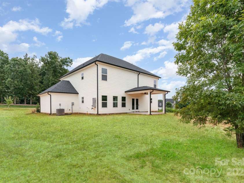 2822 Molly Pop Lane, Monroe, NC 28112.  MLS# CAR4272441, YatesRealty ID 34715. Large back yard