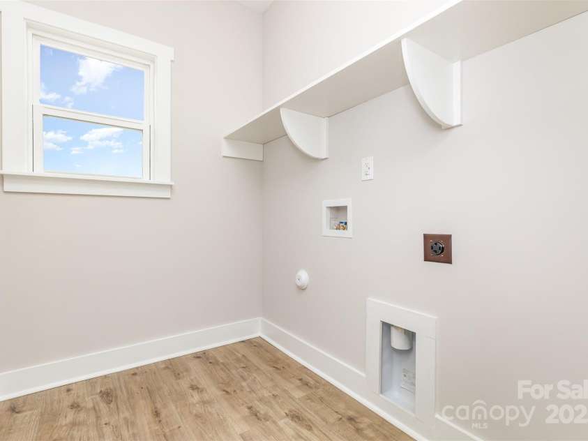 2822 Molly Pop Lane, Monroe, NC 28112.  MLS# CAR4272441, YatesRealty ID 34715. Laundry room upstairs