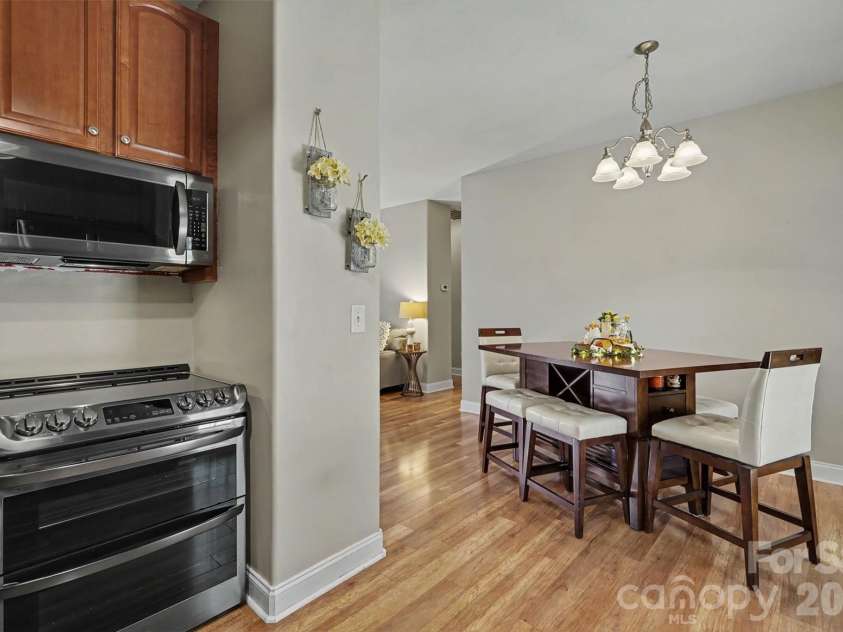 9640 Storybook Avenue, Concord, NC 28027.  MLS# CAR4396872, YatesRealty ID 34715. Dining area and kitchen