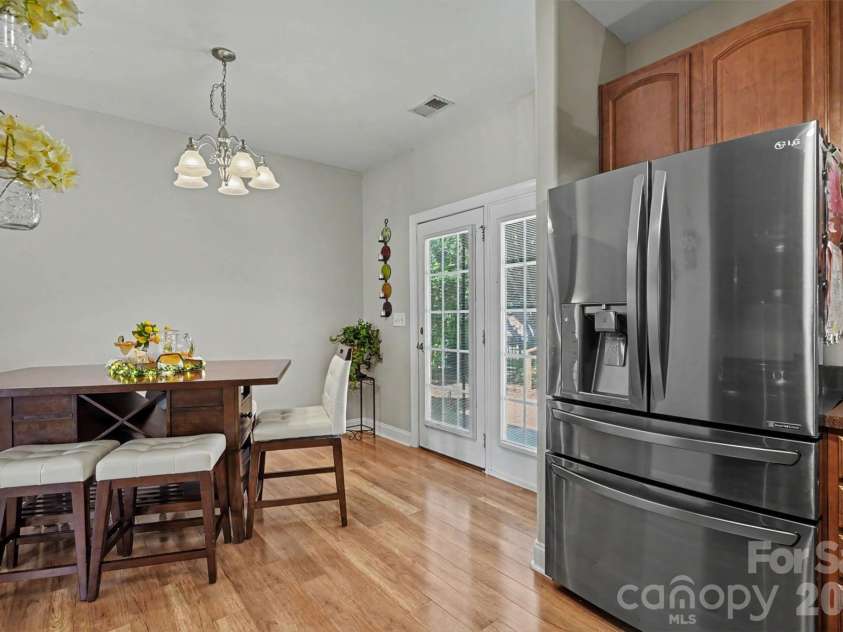 9640 Storybook Avenue, Concord, NC 28027.  MLS# CAR4396872, YatesRealty ID 34715. Dining area and kitchen
