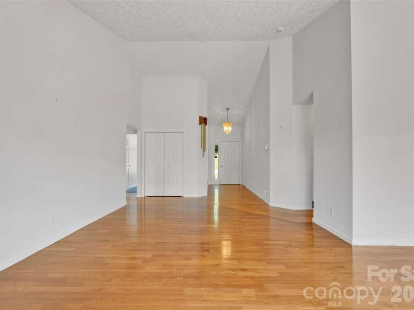 117 Caldonia Drive, Candler, NC 28715.  MLS# CAR4397414, YatesRealty ID 34717. Front door and coat closet