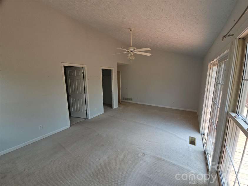 117 Caldonia Drive, Candler, NC 28715.  MLS# CAR4397414, YatesRealty ID 34717. Primary bedroom