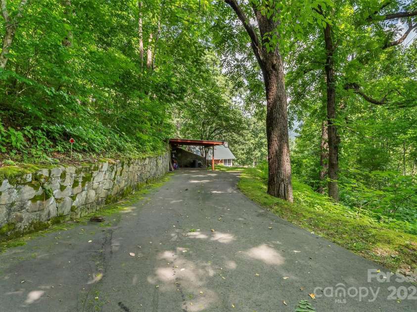 929 Soco Road, Maggie Valley, NC 28751.  MLS# CAR4275047, YatesRealty ID 34724. Driveway parking & carport