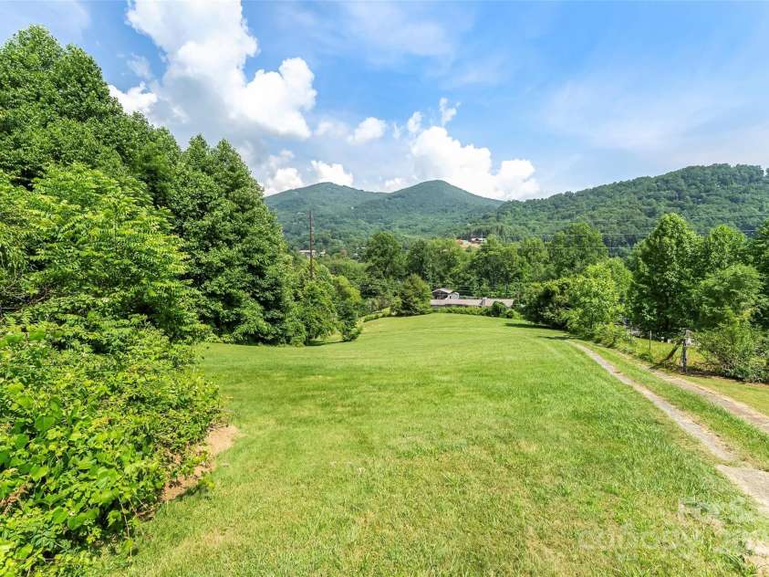 929 Soco Road, Maggie Valley, NC 28751.  MLS# CAR4275047, YatesRealty ID 34724. Lower portion of lot