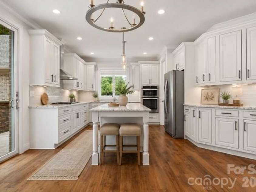 115 Buckingham Place Road, Mooresville, NC 28115.  MLS# CAR4373957, YatesRealty ID 34725. Island kitchen virtually staged