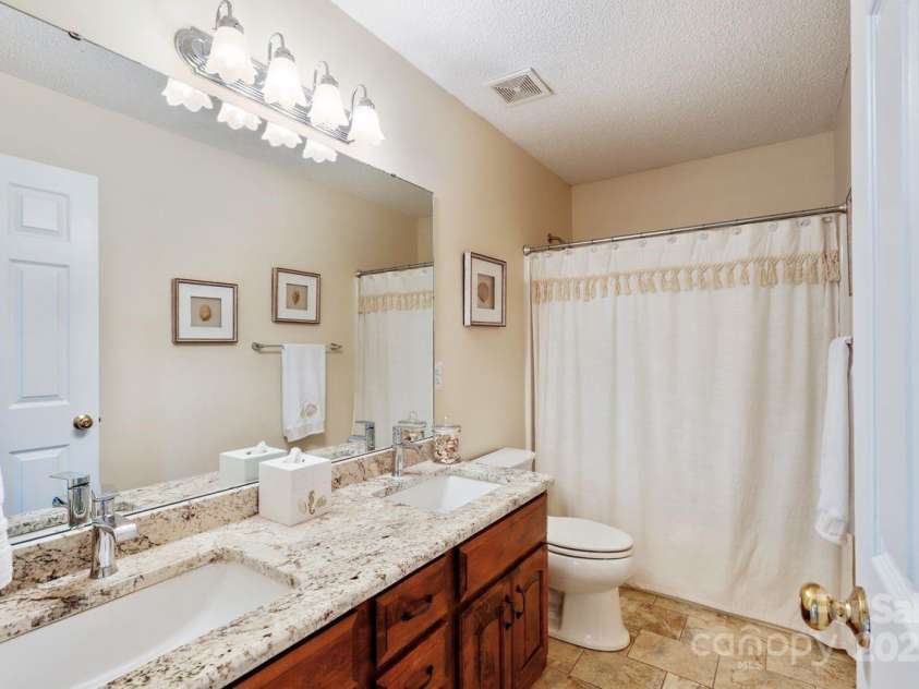 8300 Quail Hollow Drive, Harrisburg, NC 28075.  MLS# CAR4295062, YatesRealty ID 34726. 2nd Bathroom