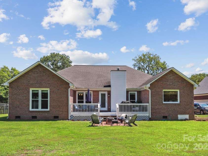 8300 Quail Hollow Drive, Harrisburg, NC 28075.  MLS# CAR4295062, YatesRealty ID 34726. Exterior of back yard.
