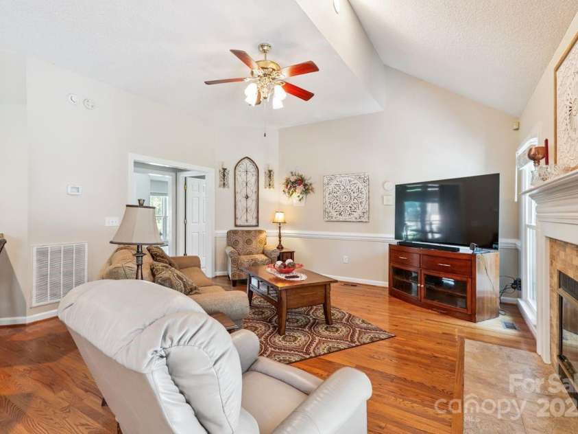 8300 Quail Hollow Drive, Harrisburg, NC 28075.  MLS# CAR4295062, YatesRealty ID 34726. Family Room.