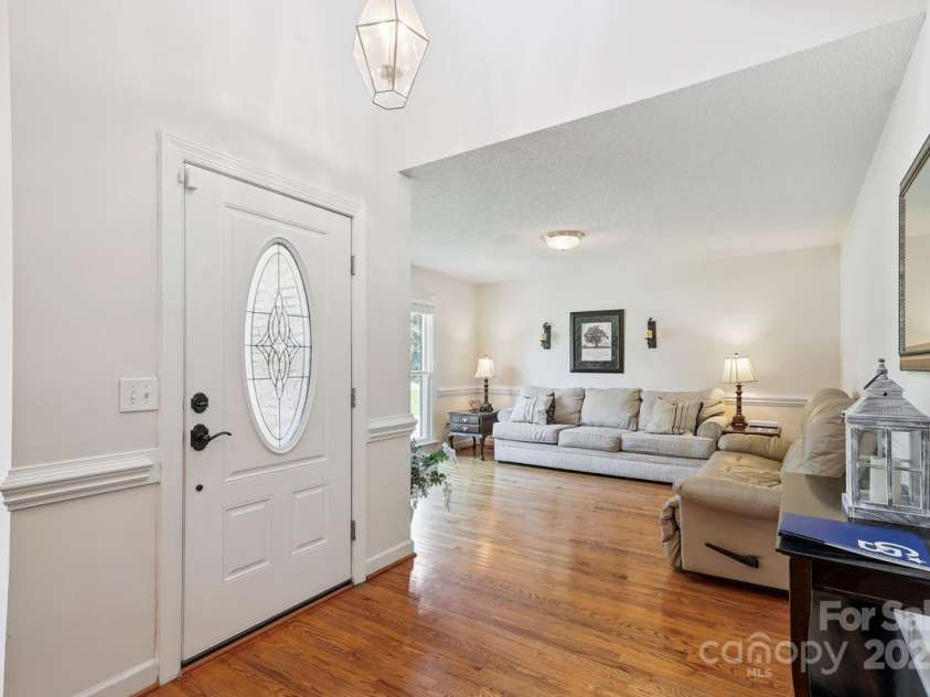 8300 Quail Hollow Drive, Harrisburg, NC 28075.  MLS# CAR4295062, YatesRealty ID 34726. Open Foyer.