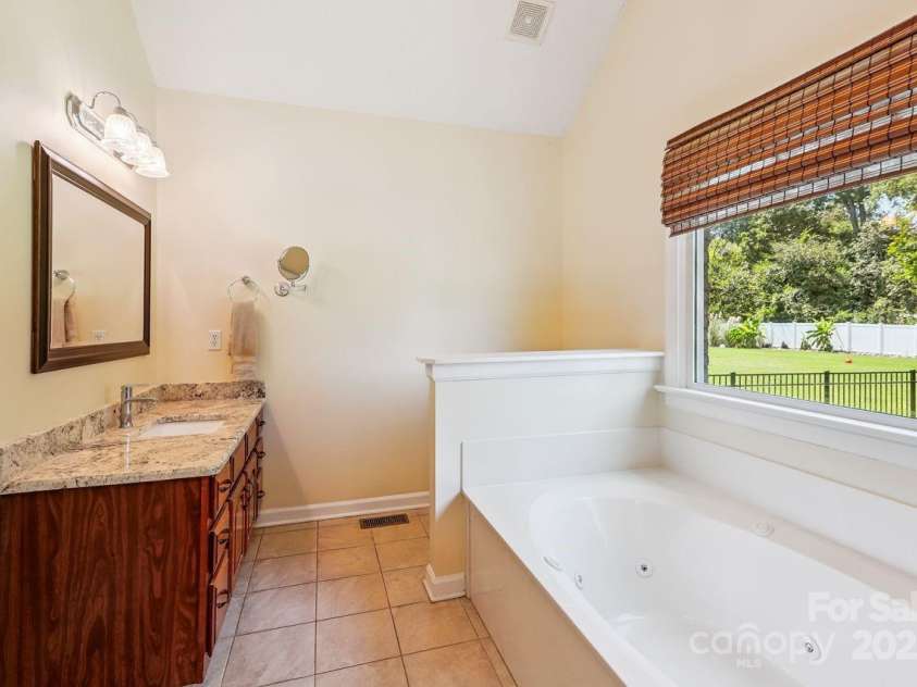 8300 Quail Hollow Drive, Harrisburg, NC 28075.  MLS# CAR4295062, YatesRealty ID 34726. Separate Vanities.