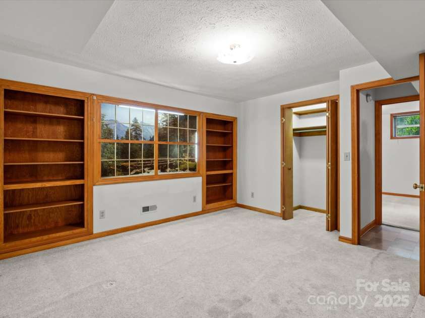 3085 Napier Drive, Hendersonville, NC 28792.  MLS# CAR4260206, YatesRealty ID 34728. Bedroom 1, basement