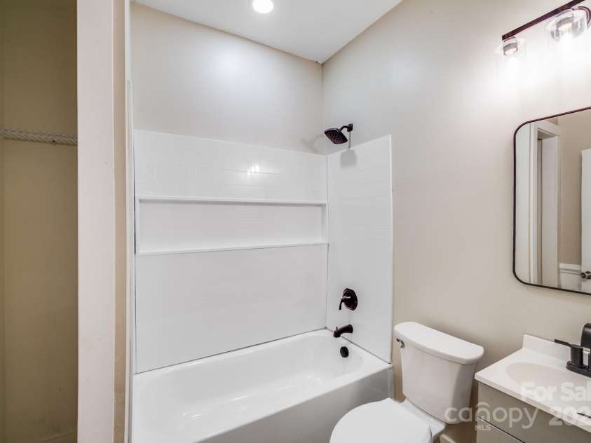 238 Academy Avenue, Concord, NC 28025.  MLS# CAR4280735, YatesRealty ID 34729. Hallway Bathroom