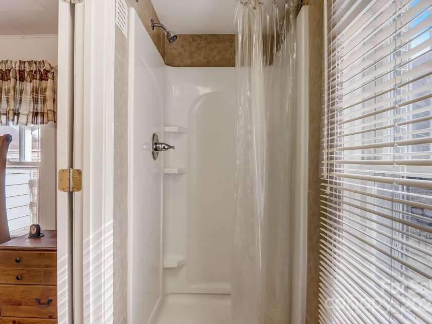 1639 Soco Road, Maggie Valley, NC 28751.  MLS# CAR4214024, YatesRealty ID 3473. Primary Bathroom