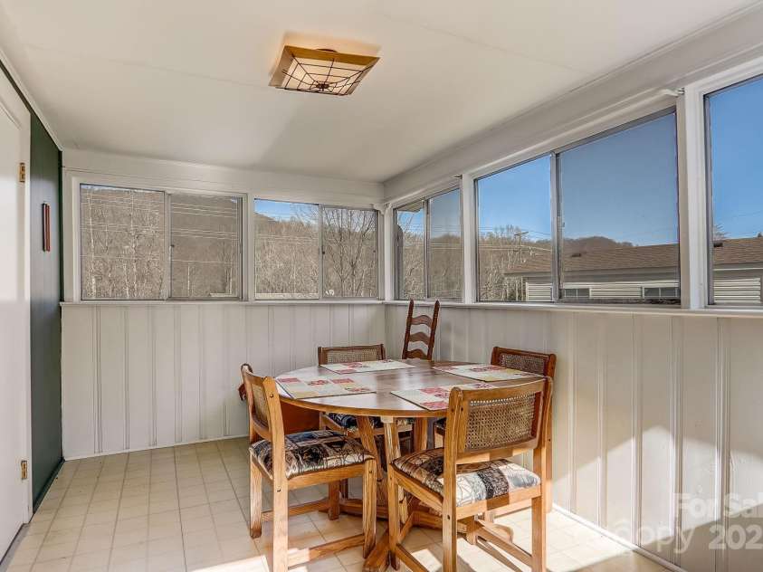 1639 Soco Road, Maggie Valley, NC 28751.  MLS# CAR4214024, YatesRealty ID 3473. Screened in sunroom