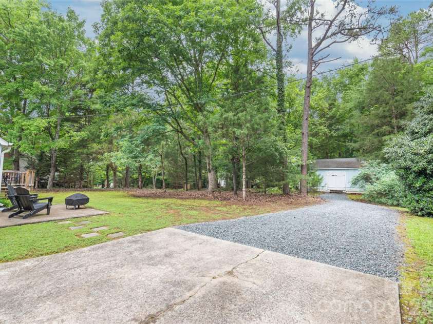 7012 Knotty Pine Road, Waxhaw, NC 28173.  MLS# CAR4388144, YatesRealty ID 34730. Driveway extends to workshed. 