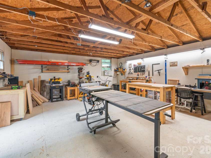 7012 Knotty Pine Road, Waxhaw, NC 28173.  MLS# CAR4388144, YatesRealty ID 34730. Inside the workshed. 
