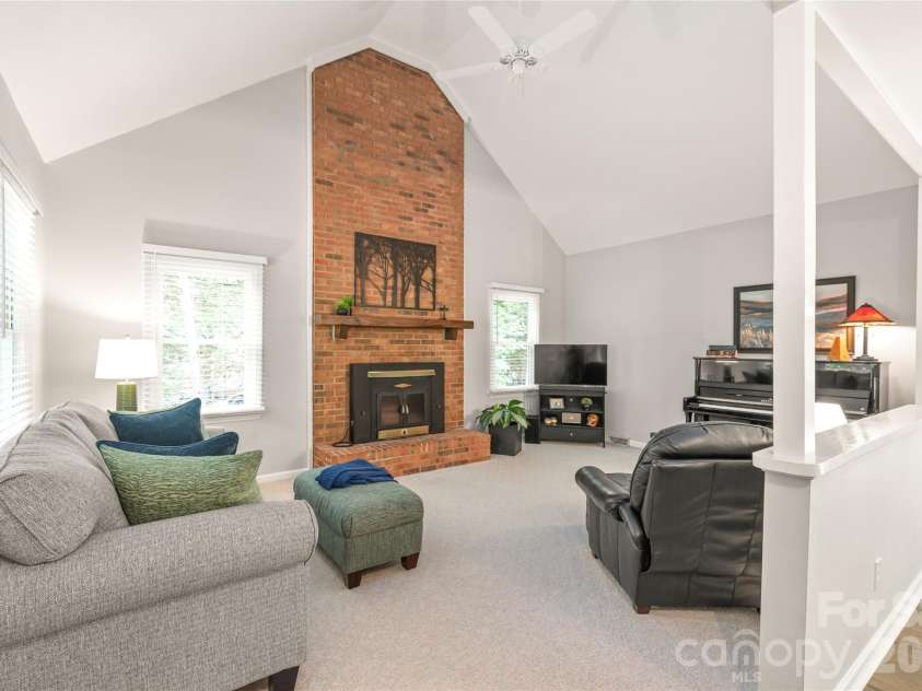 7012 Knotty Pine Road, Waxhaw, NC 28173.  MLS# CAR4388144, YatesRealty ID 34730. Large inviting living room with vaulted ceilings and great light. 