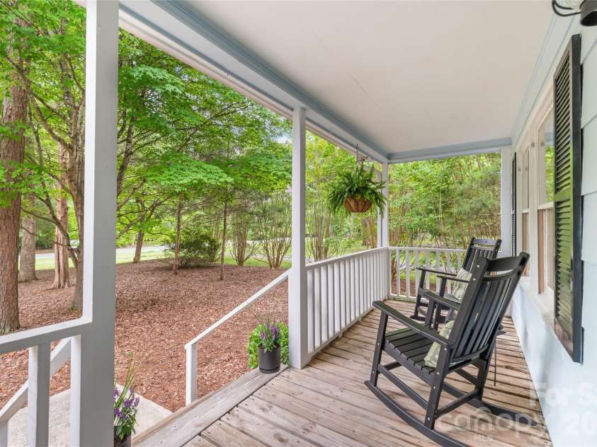 7012 Knotty Pine Road, Waxhaw, NC 28173.  MLS# CAR4388144, YatesRealty ID 34730. The perfect front porch for a morning coffee. 