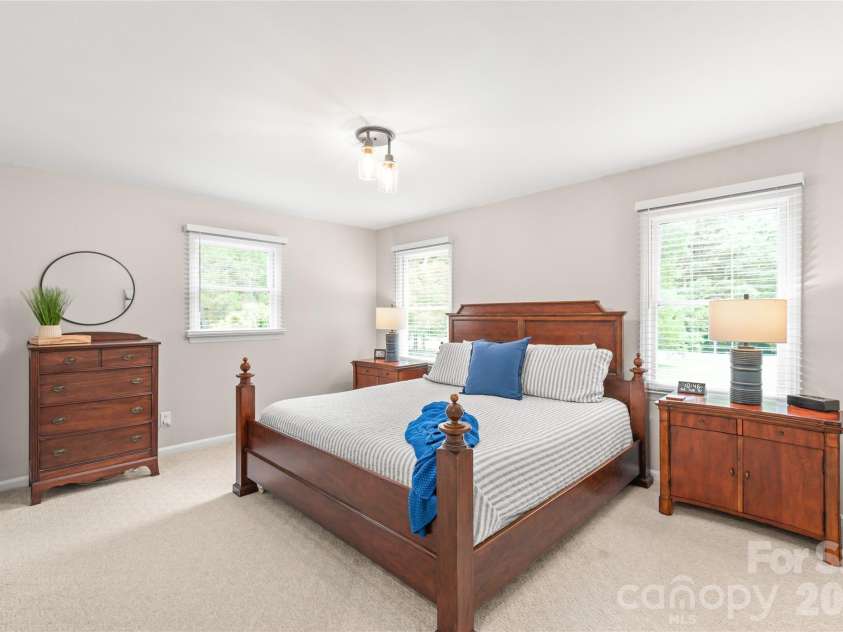 7012 Knotty Pine Road, Waxhaw, NC 28173.  MLS# CAR4388144, YatesRealty ID 34730. This large primary bedroom on the main floor makes for easy living. 
