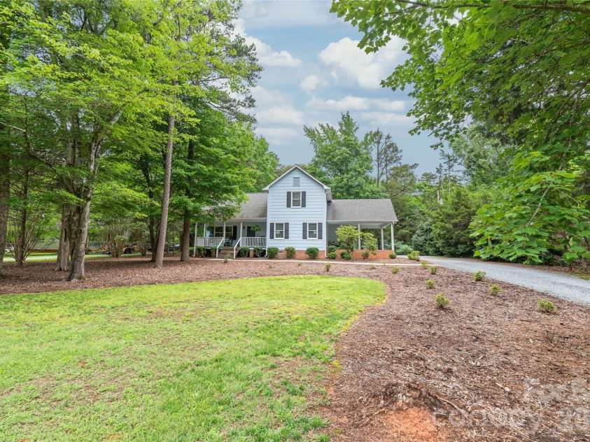 7012 Knotty Pine Road, Waxhaw, NC 28173.  MLS# CAR4388144, YatesRealty ID 34730. Tons of parking with a carport and long driveway.