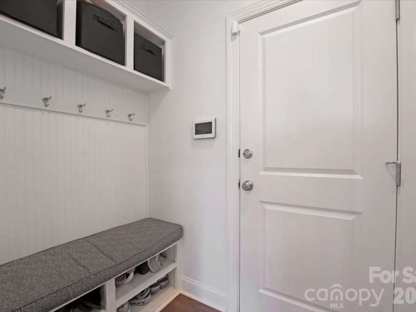 17534 Austins Creek Drive, Charlotte, NC 28278.  MLS# CAR4388620, YatesRealty ID 34731. Drop zone off the garage with storage for everything life throws at you the moment you walk through the door. Organized entry. Peaceful home. It really is that simple.