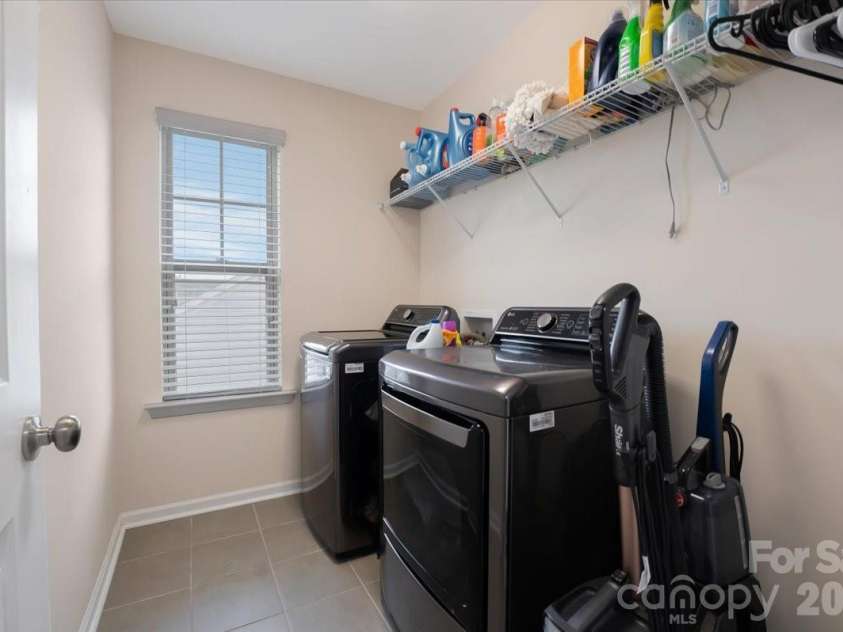 17534 Austins Creek Drive, Charlotte, NC 28278.  MLS# CAR4388620, YatesRealty ID 34731. Large laundry room. Second floor. Right where the clothes actually are. If you have ever done laundry in a home without this you already know exactly why it matters.