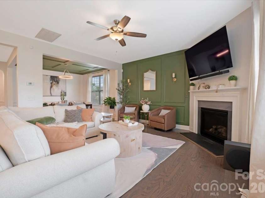 17534 Austins Creek Drive, Charlotte, NC 28278.  MLS# CAR4388620, YatesRealty ID 34731. Open concept. Gas fireplace. A living room that connects to everything and anchors it all at the same time. This is the heart of the home and it beats warmly.
