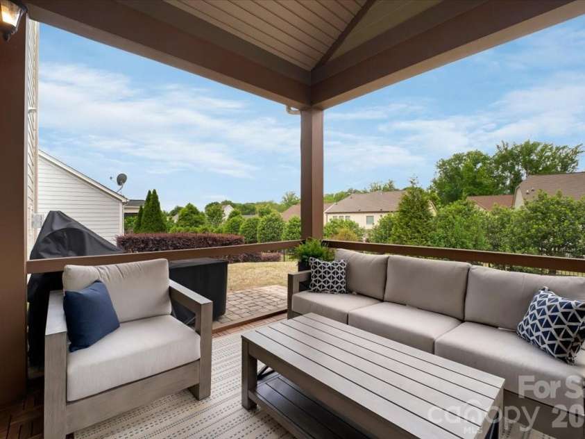 17534 Austins Creek Drive, Charlotte, NC 28278.  MLS# CAR4388620, YatesRealty ID 34731. The screened porch is where this home truly comes alive on the outside. Protected from the elements and open to everything beautiful about the backyard it gives you the perfect vantage point to oversee the action