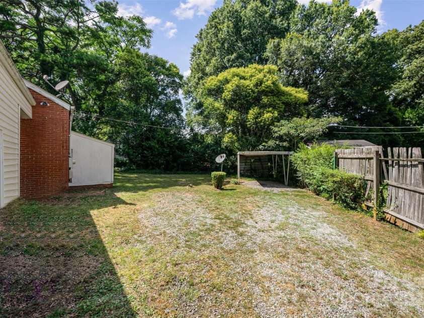 3154 Dublin Road, Charlotte, NC 28208.  MLS# CAR4288697, YatesRealty ID 34737. Backyard view from driveway