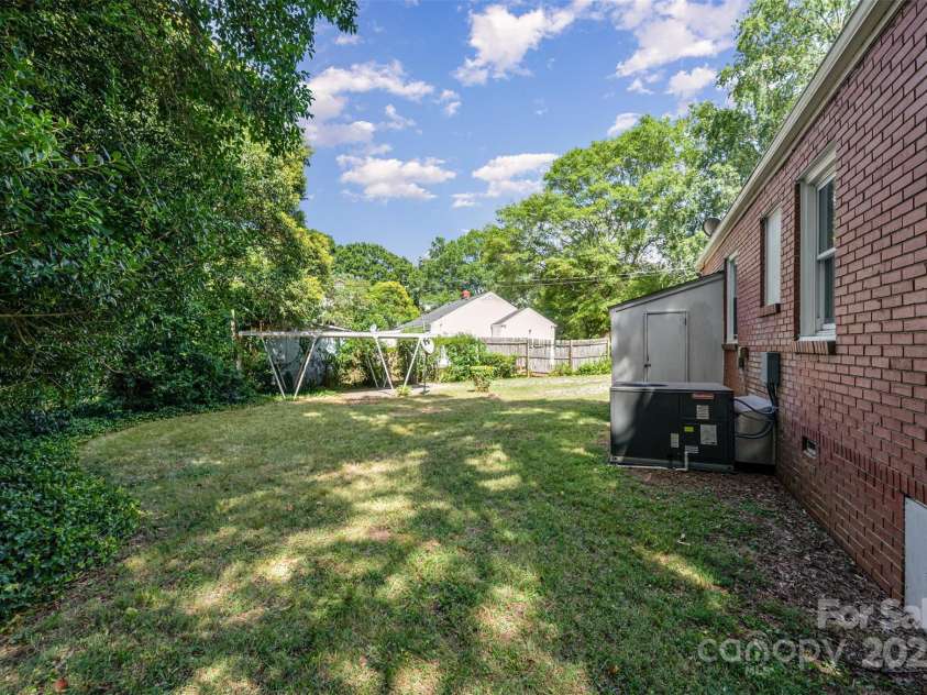3154 Dublin Road, Charlotte, NC 28208.  MLS# CAR4288697, YatesRealty ID 34737. Backyard view from left side of the house