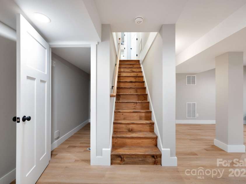 15 Pine Ridge Court, Fletcher, NC 28732.  MLS# CAR4292074, YatesRealty ID 34739. Convenient Access Between Levels