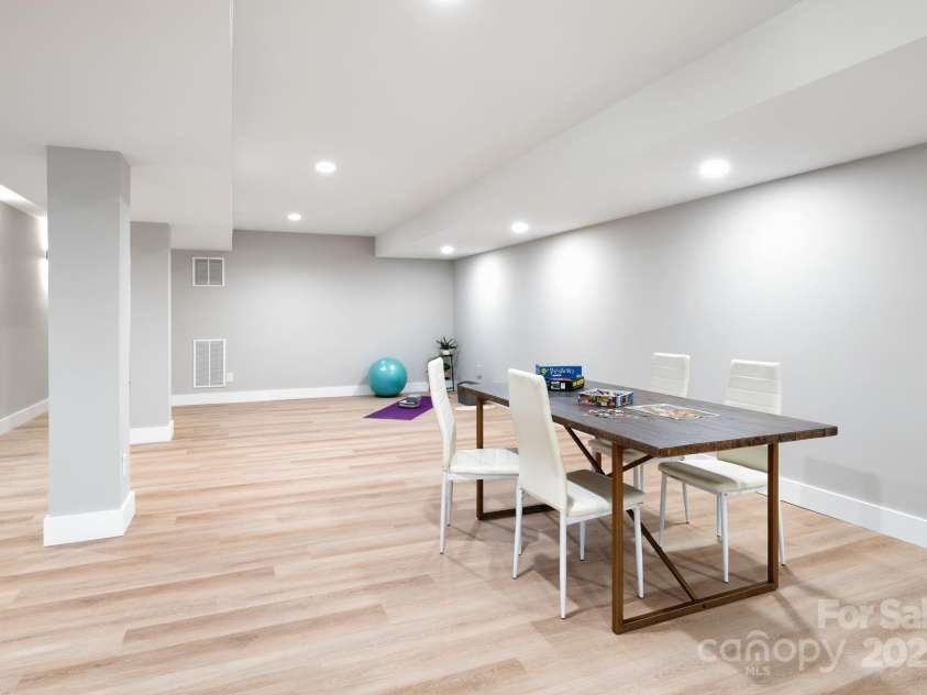 15 Pine Ridge Court, Fletcher, NC 28732.  MLS# CAR4292074, YatesRealty ID 34739. Easy Access to Plumbing for Future Kitchen/Wet Bar