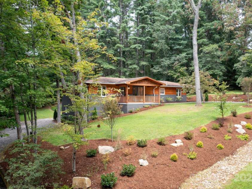 15 Pine Ridge Court, Fletcher, NC 28732.  MLS# CAR4292074, YatesRealty ID 34739. Spectacular Landscaping on a Near Full Acre Lot