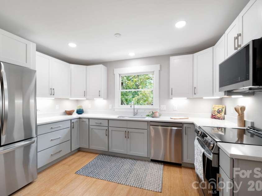 15 Pine Ridge Court, Fletcher, NC 28732.  MLS# CAR4338257, YatesRealty ID 34739. All New Cabinetry, Quartz Countertops, and Appliances