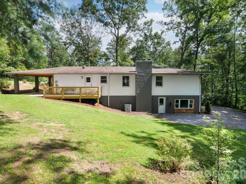 15 Pine Ridge Court, Fletcher, NC 28732.  MLS# CAR4338257, YatesRealty ID 34739. Second Driveway Access to Rear of Home