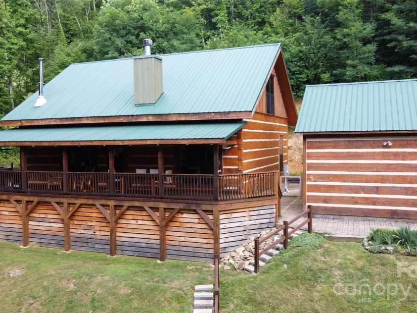 120 Spotted Fawn Lane, Waynesville, NC 28785.  MLS# CAR4284528, YatesRealty ID 34742. Another Drone Photo of the home and garage