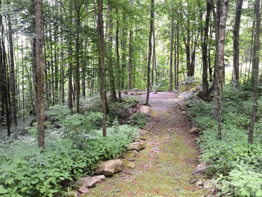120 Spotted Fawn Lane, Waynesville, NC 28785.  MLS# CAR4284528, YatesRealty ID 34742. Beautiful path to the fire pit area
